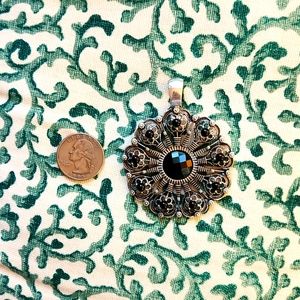 Silver and Black pendant.